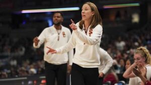 Good evening, this is [Your Name] reporting live on the latest from the world of women’s basketball. The USC Trojans' hopes of adding a Big Ten Tournament Championship to their already impressive regular season title were dashed today, as they fell to the UCLA Bruins 72-67 in the championship game. Despite a strong first half where USC led 45-35, things quickly unraveled after the break. The Trojans appeared on track for a third consecutive win over UCLA, a team they had already beaten twice during the regular season. However, the Bruins mounted an impressive comeback, led by center *Lauren Betts*, who dominated inside. Meanwhile, USC's offense went ice cold, failing to score a single field goal during a critical 10-minute stretch between the third and fourth quarters. The biggest disappointment came from USC's star, *JuJu Watkins*, who struggled with her shooting throughout the game. She finished 9 for 28 from the field, adding to the frustration with five turnovers and just two assists. The game was further marred by turnovers from both teams—UCLA committed 24, while USC had 19—making it a sloppy and chaotic contest. Looking ahead, the Trojans now turn their attention to the upcoming NCAA Tournament. As for their title hopes, USC is currently tied with UCLA and Texas for the third-best odds to win the National Championship at +550, according to *FanDuel Sportsbook*. The favorites remain *UConn* and *South Carolina*, both sitting at +290. Right below the Trojans are the *Notre Dame Fighting Irish* at +750. USC, with a stellar 28-3 record, remains in a strong position to earn one of the coveted No. 1 seeds in the NCAA Tournament. This includes two regular-season victories over UCLA, who have just two losses all year, both to USC. According to *ESPN’s* bracket projection, South Carolina, Texas, UCLA, and USC are expected to secure those top four spots. However, there’s still room for surprises. UConn, despite being tied for the best title odds, is currently projected to be a No. 2 seed, despite their strong 31-3 record and a Big East championship. The big question now is whether this will finally be the year for a fresh contender to make a push for the title, challenging the dominance of teams like UConn, South Carolina, and Notre Dame, who have all been mainstays in national title games over the last decade. That's all from the Big Ten Tournament for now. Stay tuned as the Trojans prepare for March Madness and the upcoming NCAA Tournament. We’ll be bringing you all the latest updates as the tournament unfolds.